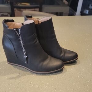 Sleek Black Leather Wedge Booties